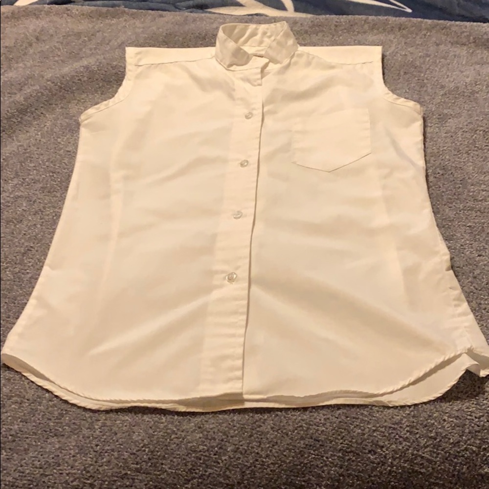 Equestrian sleeveless riding shirt.